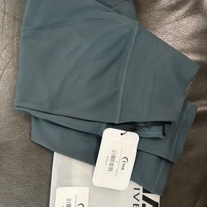 ZYIA dark teal confluence legging